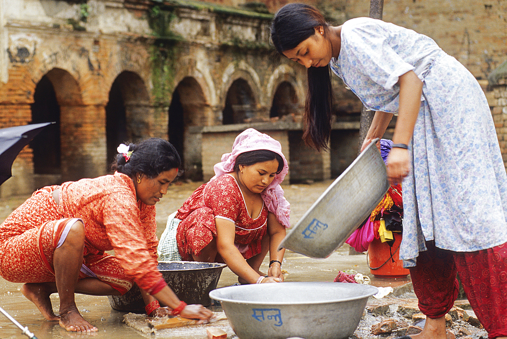 Washing-up at the water fountain,Bungamati village of Kathmandu valley,Lalitpur District,Nepal,Himalaya,South Asia
