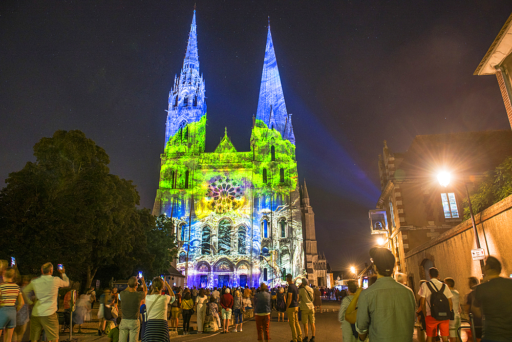 West facade of the Cathedral in Lights, artistic designs by Spectaculaires, Les Allumeurs d'Images, seen from the forecourt, UNESCO World Heritage Site, Chartres, Eure-et-Loir department, Centre-Val-de-Loire region, France, Europe