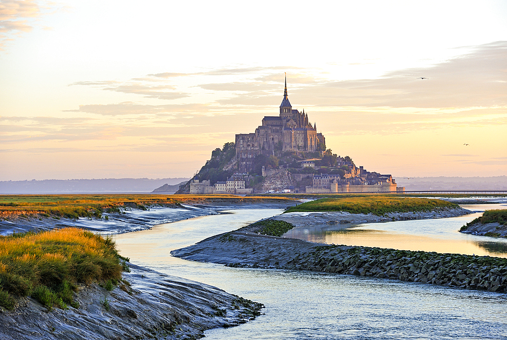 Mont-Saint-Michel, UNESCO World Heritage Site, in the mouth of the Couesnon river at sunrise, Manche department, Normandy region, France, Europe