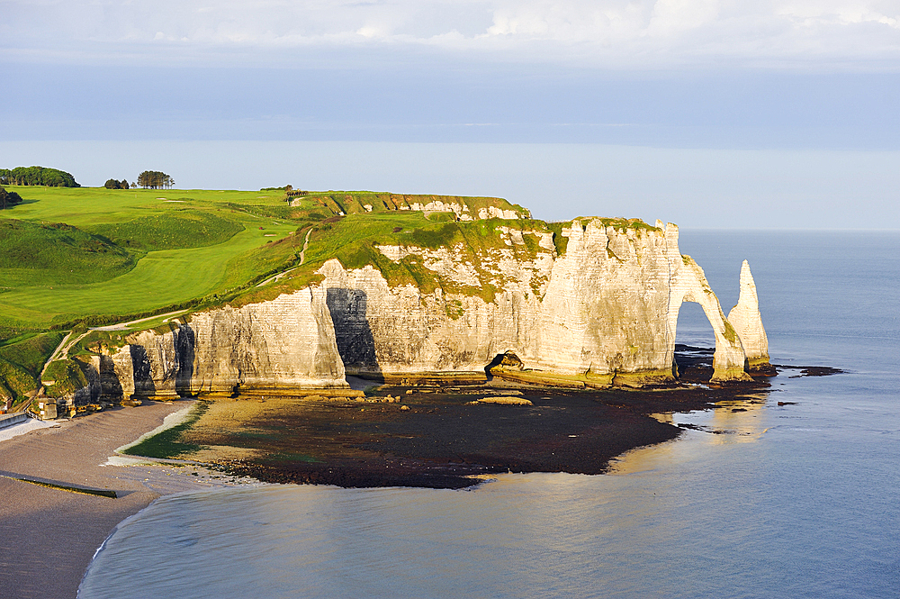 Chalk cliffs with arch and l'Aiguille (the Needle), Etretat, Seine-Maritime department, Normandy region, France, Europe