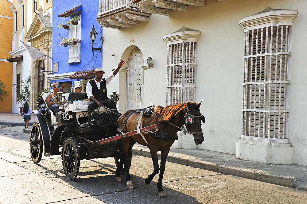 Horse-drawn carriage in the downtown colonial walled city, Cartagena, Colombia, South America