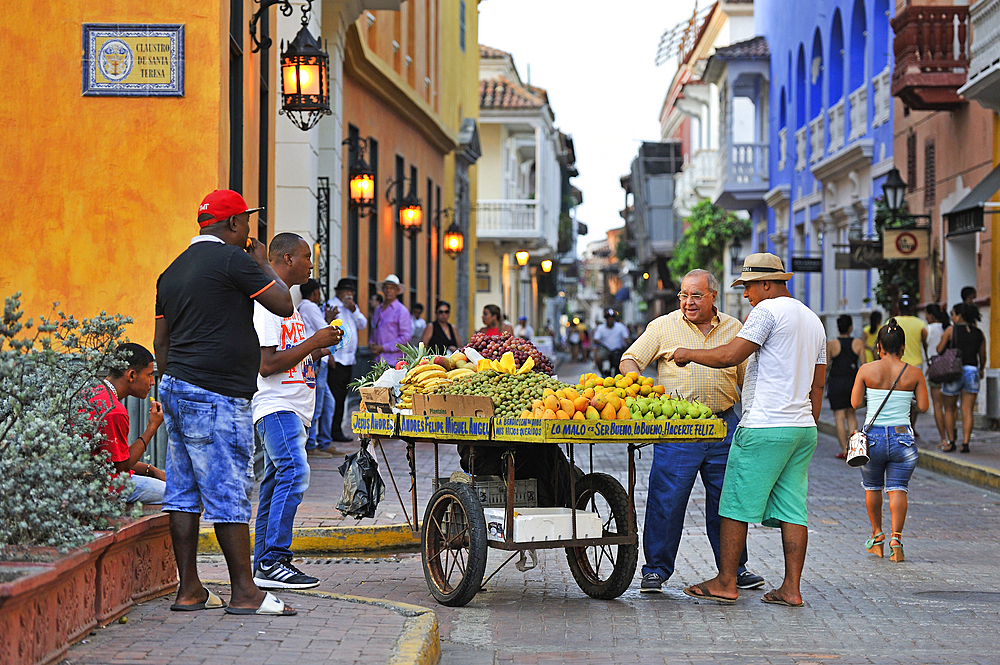 Street vendor of fruits inside the downtown colonial walled city, Cartagena, Colombia, South America