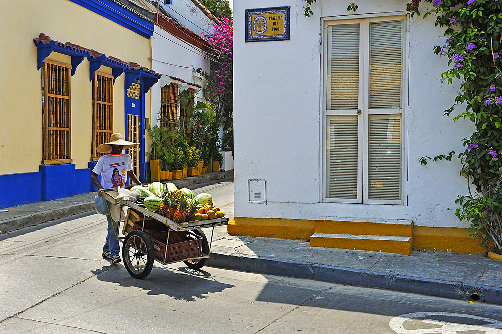 Street vendor selling fruit in Getsemani area, Cartagena, Colombia, South America