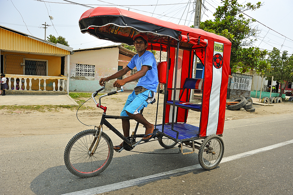 Rickshaw in a village traversed by the causeway near Cienaga, department of Magdalena, Caribbean Region, Colombia, South America