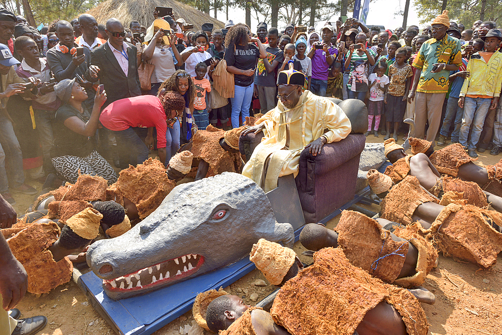 Paramount Chief Chitimukulu arriving to start the Ukusefya Pa Ng'wena Ceremony riding on his crocodile chair, Kasama, Zambia, Africa