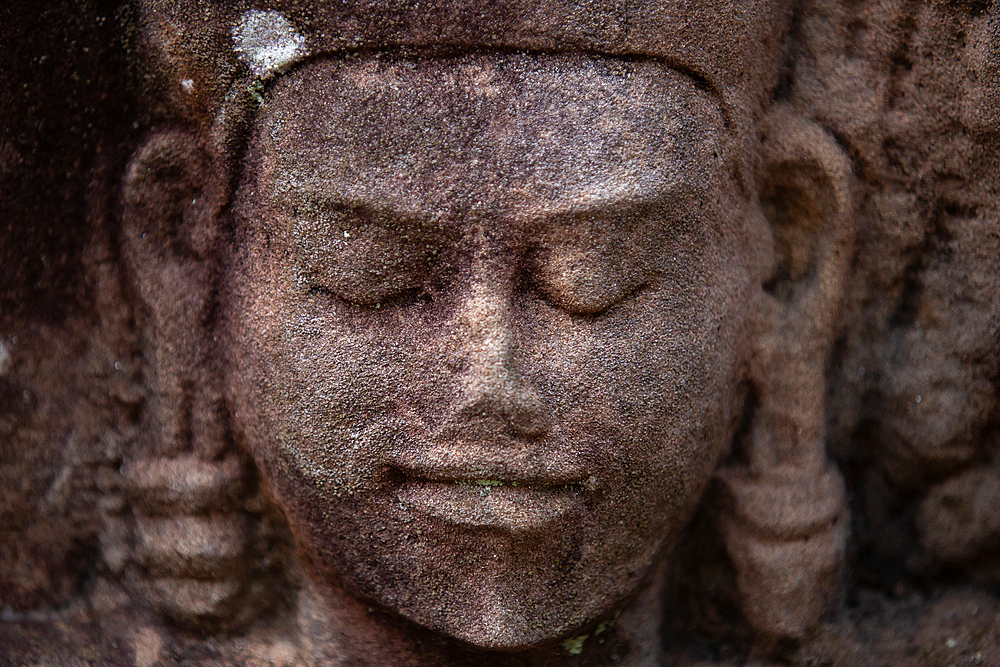 Detail of the carved facade at one of the temples in Angkor Wat complex, UNESCO World Heritage Site, Cambodia, Indochina, Southeast Asia, Asia