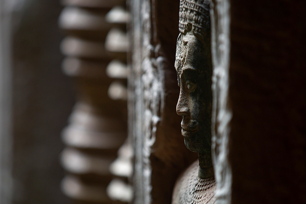 Detail of the carved facade at one of the temples in Angkor Wat complex, UNESCO World Heritage Site, Cambodia, Indochina, Southeast Asia, Asia