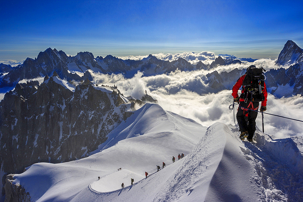 Mountain climbers descending from the Aiguille du Midi (Mont Blanc), France.