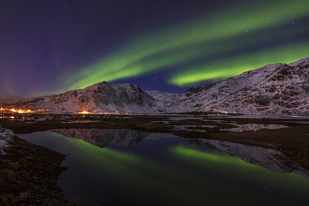 Northern lights over Stamsund fjord (Lofoten Islands), Norway.