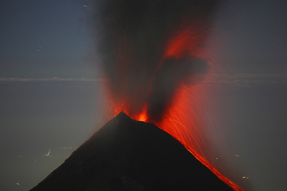 December 30, 2007 - Lava is flung high in the air during a nighttime eruption of Fuego volcano, Antigua, Guatemala.