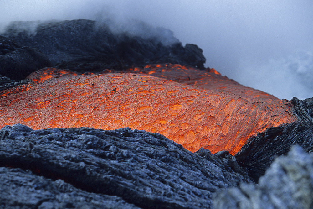 Lava flowing into sea, Kilauea volcano, Big Island, Hawaii.