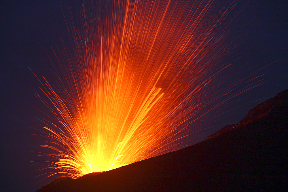 May 21, 2008 - Lava bomb trajectories visible during nighttime vulcanian eruption of Anak Krakatau volcano, Sunda Strait, Java, Indonesia.