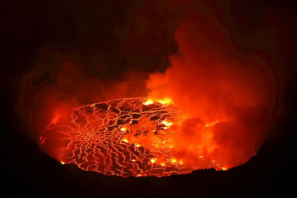 January 21, 2011 - Nighttime view of lava lake in pit crater, Nyiragongo Volcano, Democratic Republic of the Congo.