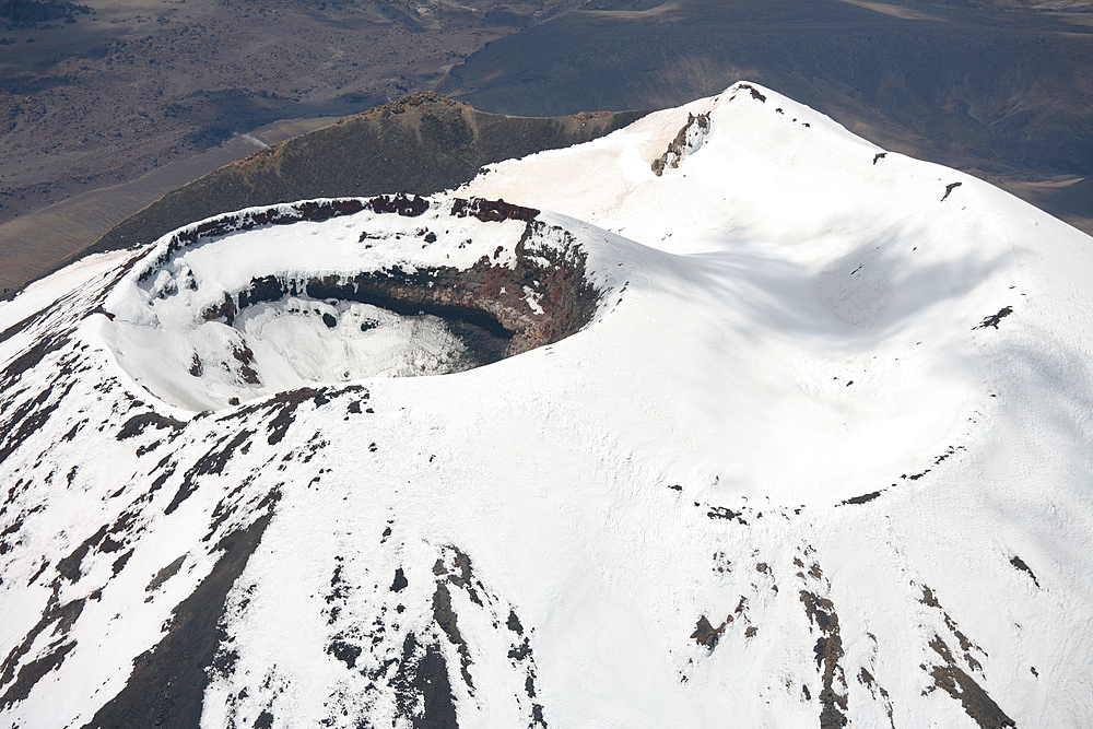 November 2007 - Snow-covered Ngauruhoe cone, Mount Tongariro volcano, New Zealand.