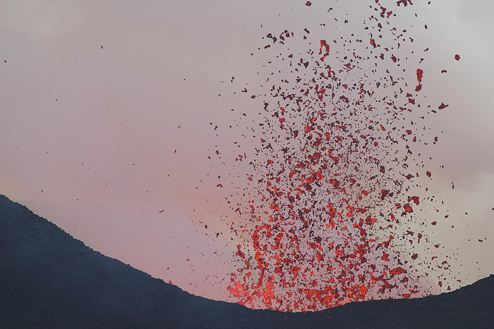 January 24, 2012 - Incandescent lava bombs expelled during a basaltic fissure eruption on Nyamuragira Volcano, Kimanura Eruption.