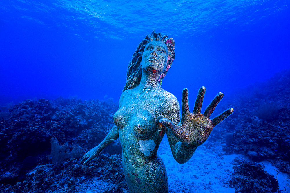 Underwater mermaid statue at Grand Cayman island.