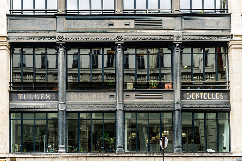 Old factory with ghost sign, Paris, France