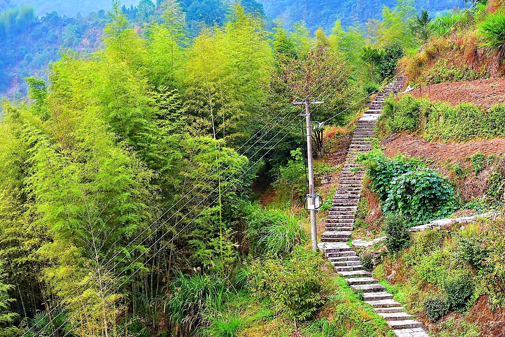 Steps on the hillside of picturesque Shanxiabao village, Wuyi County, Jinhua City, Zhejiang Province, China. Under cultural protection, the 800 year old ancient village was featured in Chinese National Geography and still has buildings from 1723-1735.