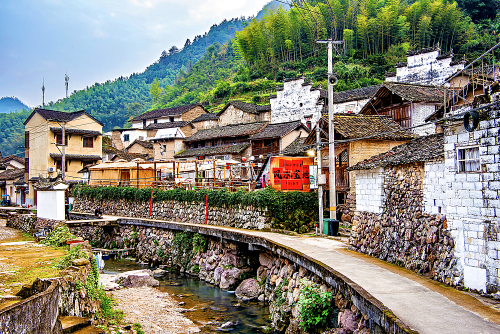 Creek running through the picturesque Shanxiabao village, Wuyi County, Jinhua City, Zhejiang Province, China. Under cultural protection, the 800 year old ancient village was featured in Chinese National Geography and still has buildings from 1723-1735.