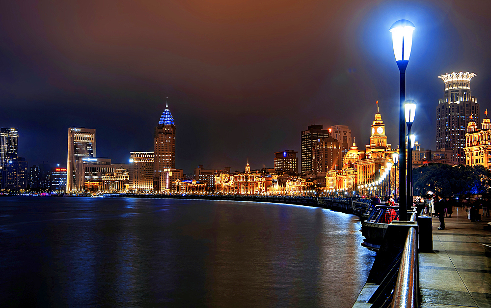 Magnificent view of the Bund at night along the Huangpu River, Shanghai, China
