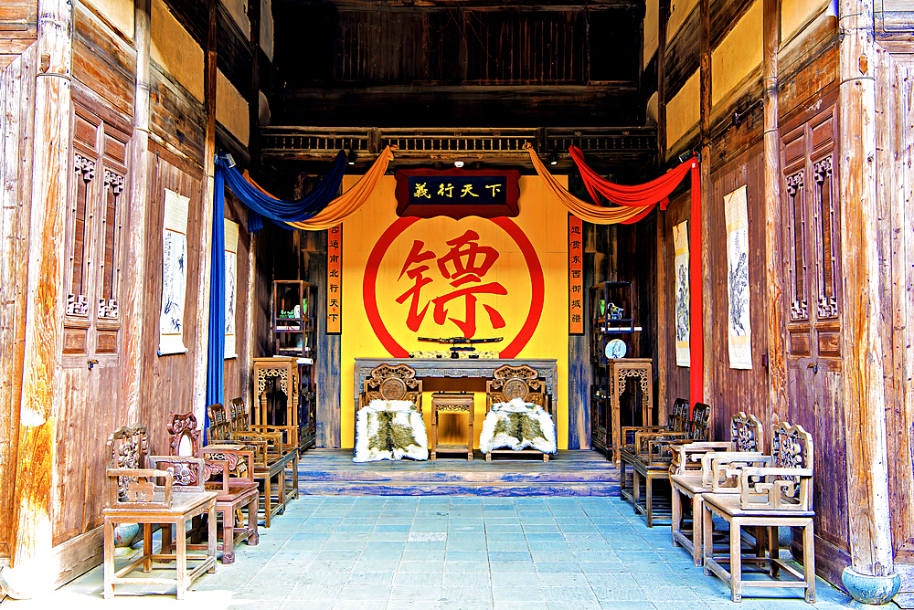 The hall of a traditional security service establishment, Nianbadu ancient town (since 878 AD), Jiangshan City, Zhejiang Province, China. Services are akin to modern day security companies, transporting valuables and providing protection services.