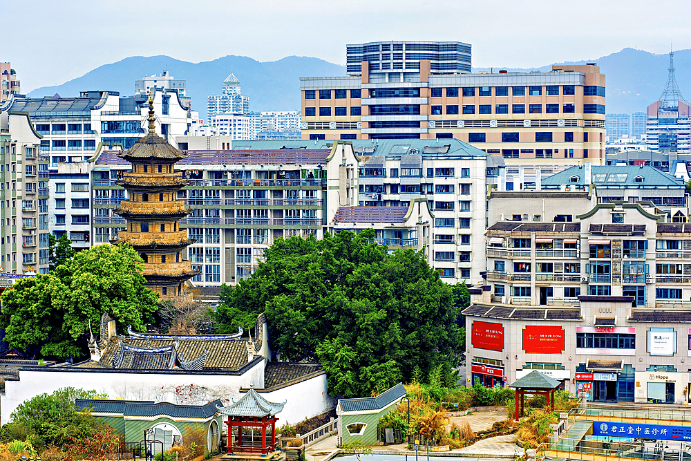 Fuzhou city view with the 'Wu' (dark) pagoda, Fuzhou, Fujian Province, China. The pagoda was first built in 799 AD (rebuilt 941 AD).