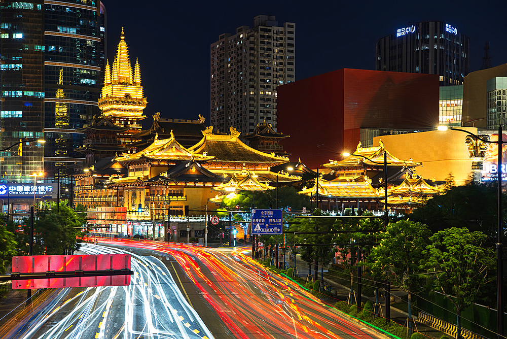 JingAn Temple at night, Shanghai, China. First built in 247 A.D. it moved from its original location beside Suzhou Creek to its current location in 1216. The temple existed before Shanghai was founded in 1291.