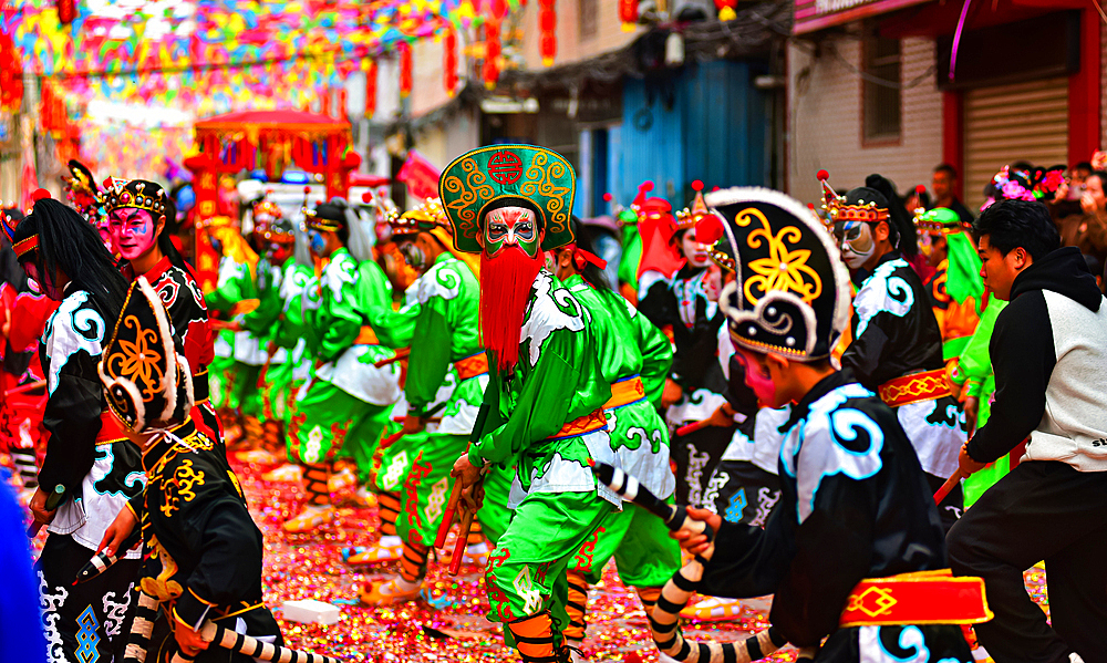 Yingge Dance performers at a parade in Puning City, Guangdong Province, China. A native dance to the Chaozhou and Shantou area dating back to the Yuan dynasty. Incorporates martial arts and drama. Current characters from the Chinese classic, Water Margin.