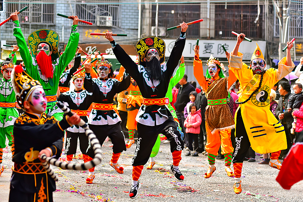 Yingge Dance performers at a parade in Puning City, Guangdong Province, China. A native dance to the Chaozhou and Shantou area dating back to the Yuan dynasty. Incorporates martial arts and drama. Current characters from the Chinese classic, Water Margin.