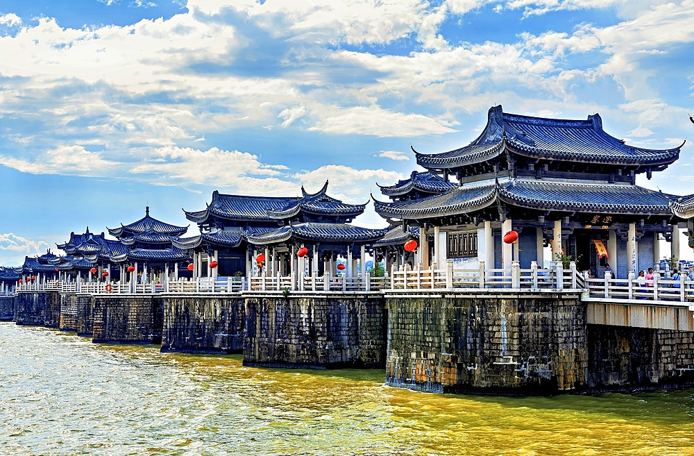 The pavilions of Guangji Bridge, built 1170, it is one of China's four famous ancient bridges. The bridge is connected by 18 boats that can be removed to allow passage of vessels. Chaozhou, Guangdong province, China