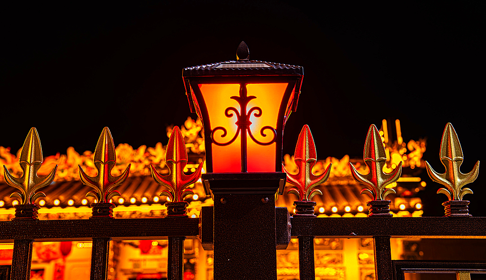 Beautiful lanterns on the gates of an ancestral hall in Puning City, Guangdong Province, China. Such halls or temples are used for collective rituals and festivals in honor of the ancestors and also for other family and community-related functions.