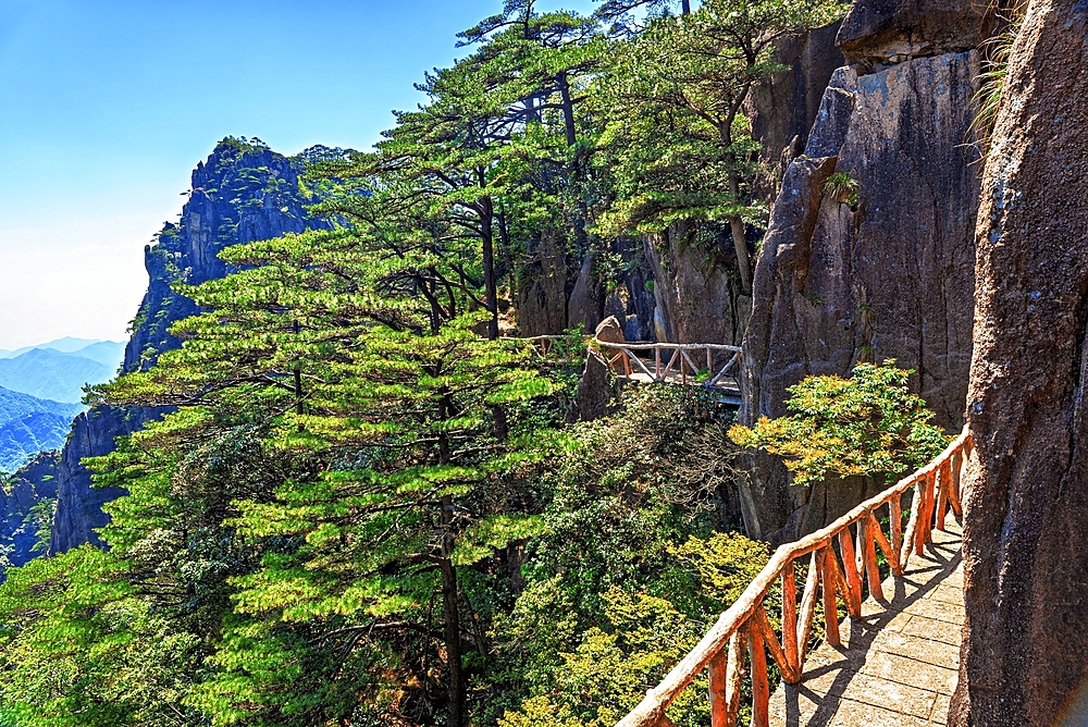 Cliffside walkway in Huangshan (Mt Huang), UNESCO World Heritage and UNESCO Global Geopark, Anhui Province, China.