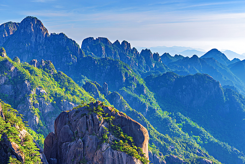 Misty mountain scapes of Huangshan (Mt Huang/Yellow Mountain), UNESCO World Heritage and UNESCO Global Geopark, Anhui Province, China.
