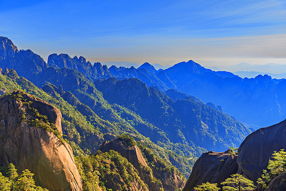 Misty mountain scapes of Huangshan (Mt Huang/Yellow Mountain), UNESCO World Heritage and UNESCO Global Geopark, Anhui Province, China.