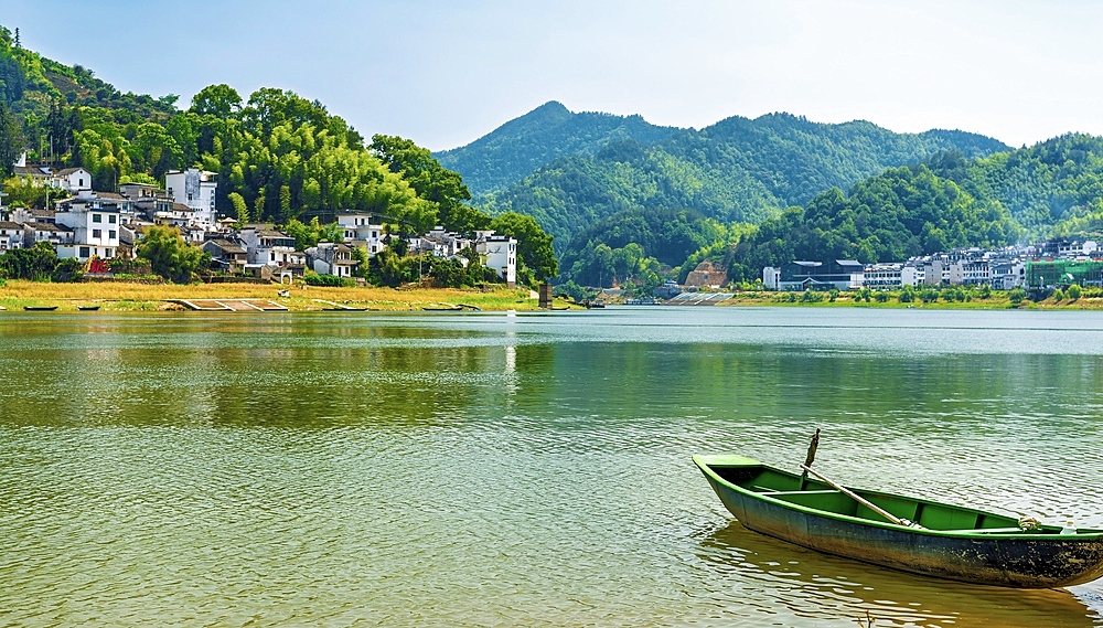 Green boat on XinAn River, WuFuShan Village, Huangshan, Anhui Province, China