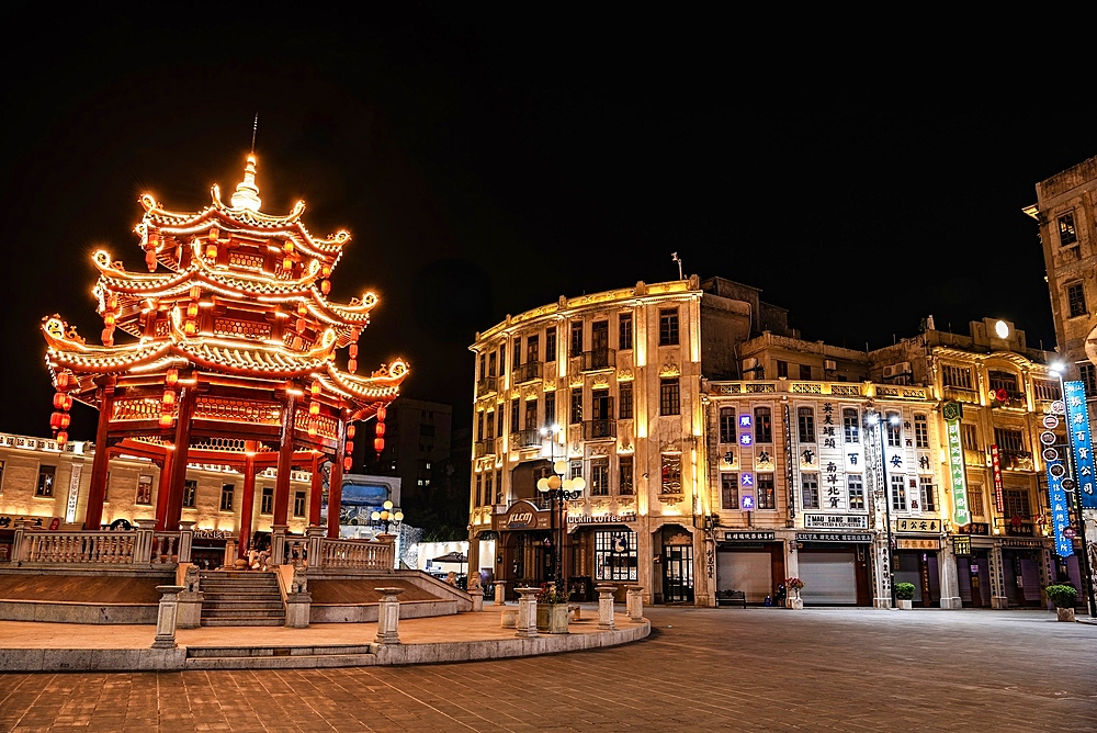 Tranquil late night view of Xiaogongyuan (literally mean Little Park) in Shantou City, Guangdong Province, China. The area is the key tourist spot in Shantou City with buildings constructed during the Republic of China era (1911 - 1949).