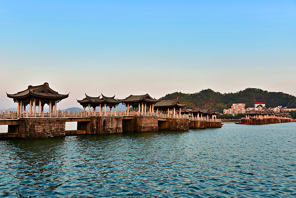 Guangji Bridge, built in 1170, is one of China's four famous ancient bridges. Chaozhou City, Guangdong province, China. The bridge is connected by 18 boats that can be moved to allow passage for vessels.