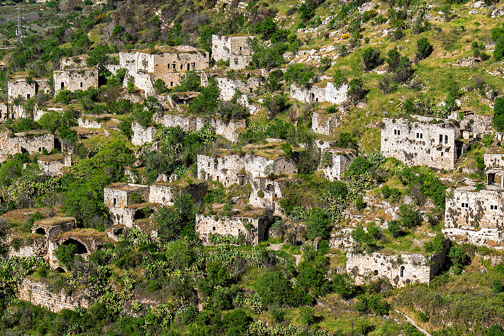 Ruined houses of an ancient arabian abandoned village Lifta located on hills near Jerusalem, Israel.