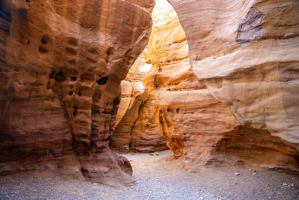 Amazing labyrinths in the gorge of the red canyon in Eilat, israel carved by water flows in the red sandstone rocks