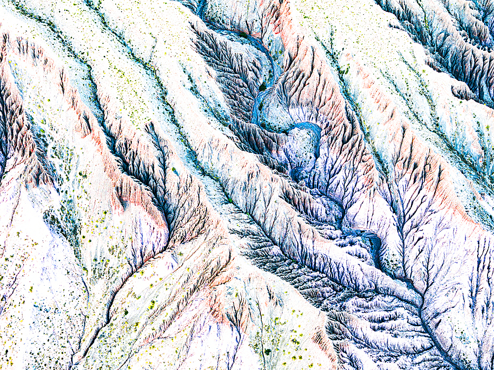 Aerial view of the scenic striated rock layers in the Hill of Seven Colors or Cerro de los Siete Colores, Purmamarca, Argentina