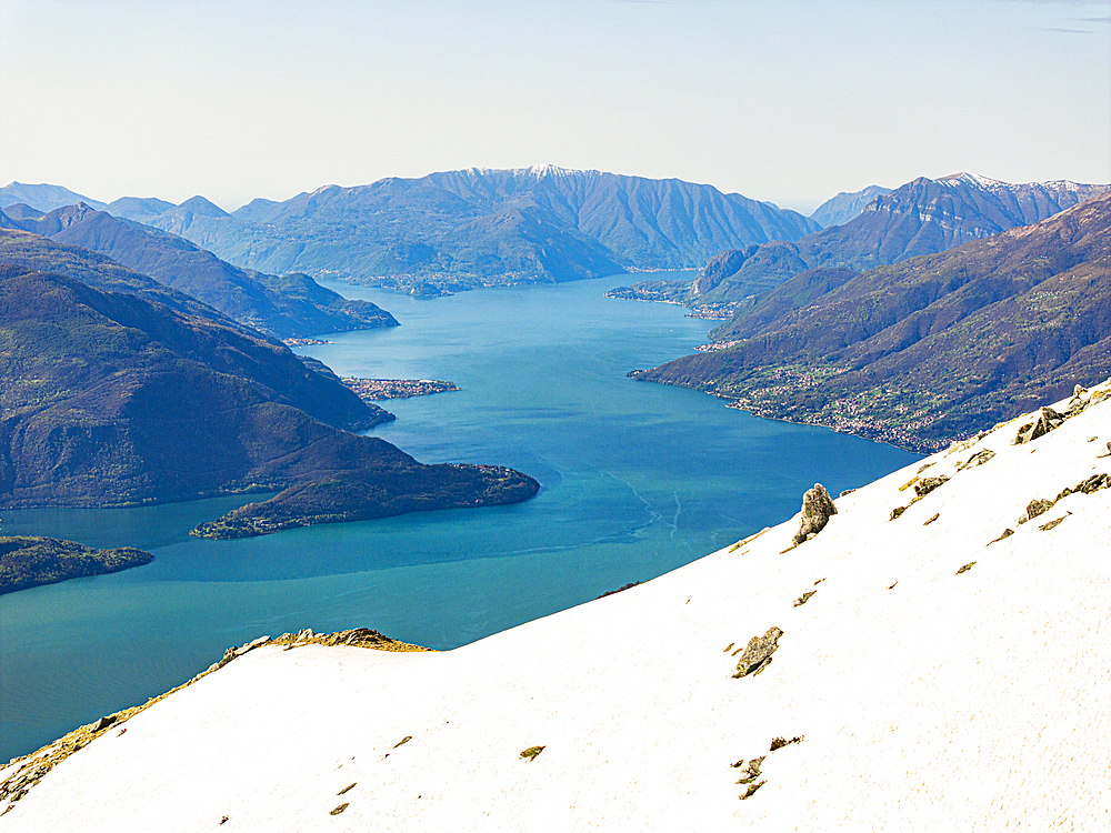 Snowy mountains overlooking Lake Como, Alto Lario, Como province, Lombardy, Italy