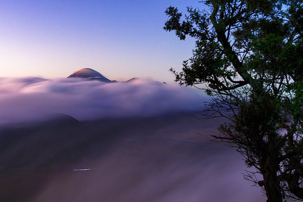 Mount Bromo in fog at night, Bromo Tengger Semeru National Park, East Java, Indonesia
