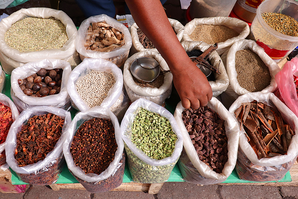 Vendor selling spices for Biryani (mixed rice dish) at a market during the holy fasting month of Ramadan