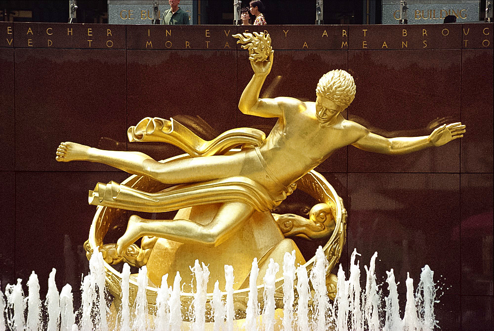 Gold sculpture above a water fountain, Rockefeller Center, Manhattan, New York City, United States of America, North America