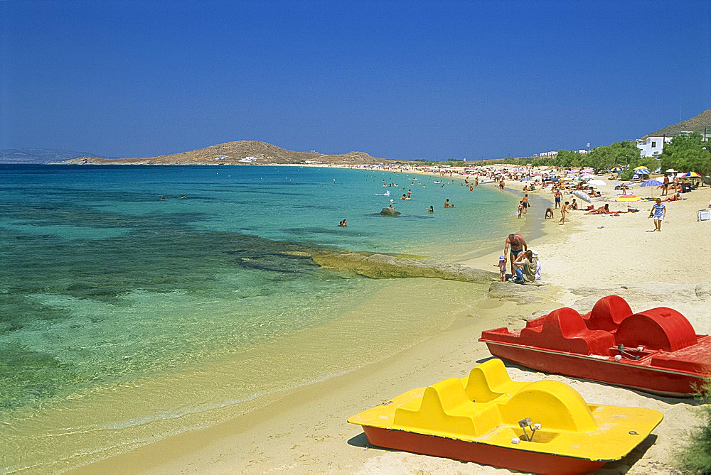 Pedal boats and tourists on the beach at Prokiopios, on Naxos, Cyclades Islands, Greek Islands, Greece, Europe