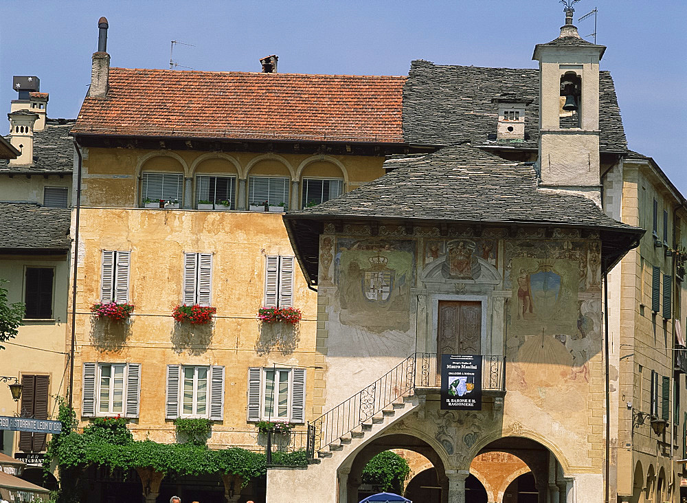 Painted walls on a building in the town of Orta on Lake Orta, Piedmont, Italy, Europe