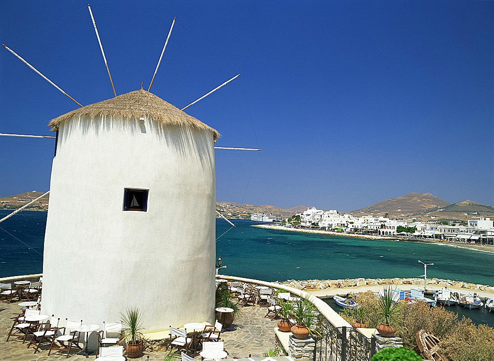 Windmill and town of Paroikia on Paros, Cyclades, Greek Islands, Greece, Europe