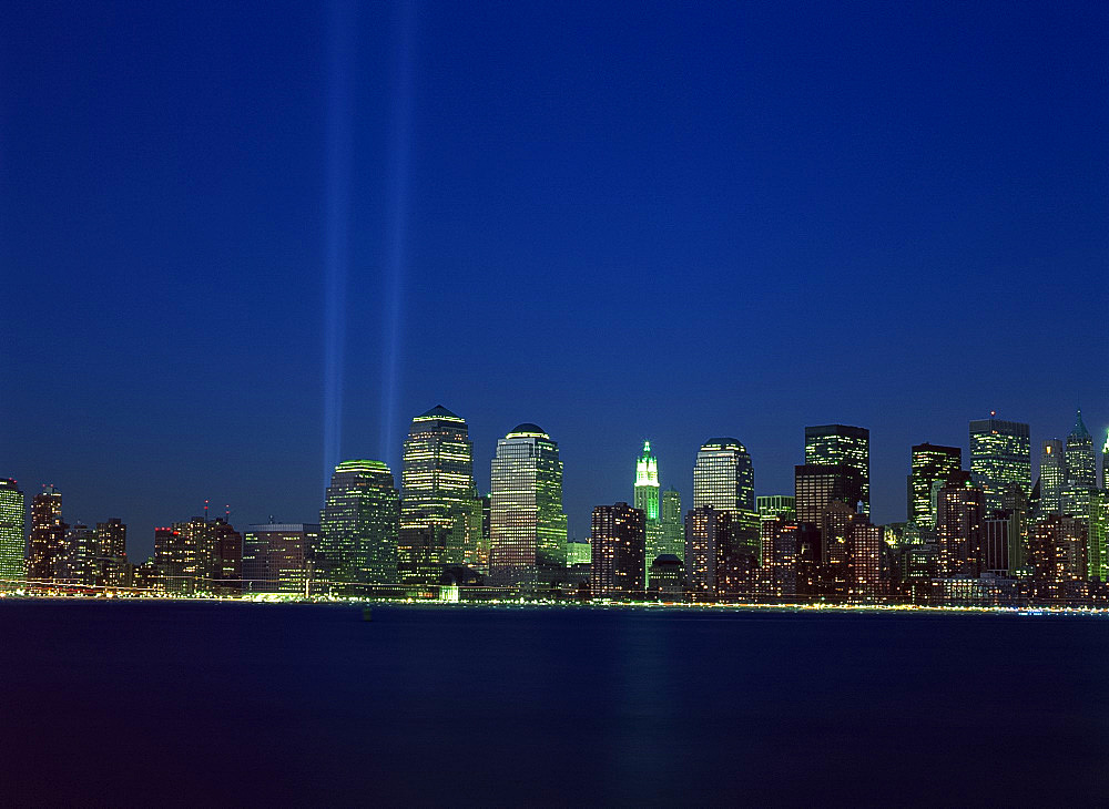 Lower Manhattan skyline and World Trade Center memorial lights, New York City, United States of America, North America