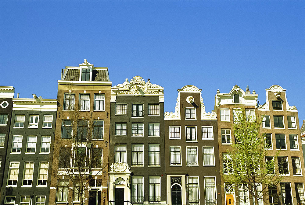 Old merchant houses on the canal in Amsterdam, Holland, The Netherlands