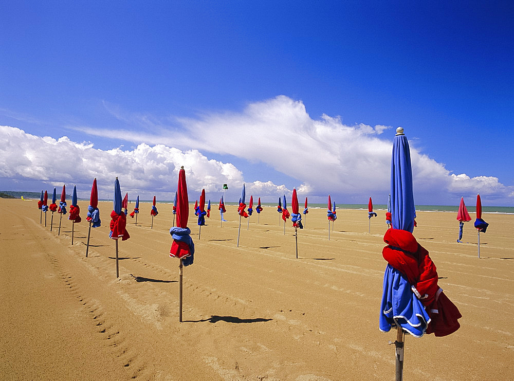 Colourful umbrellas on the beach, Deauville, Normandy, France *** Local Caption ***